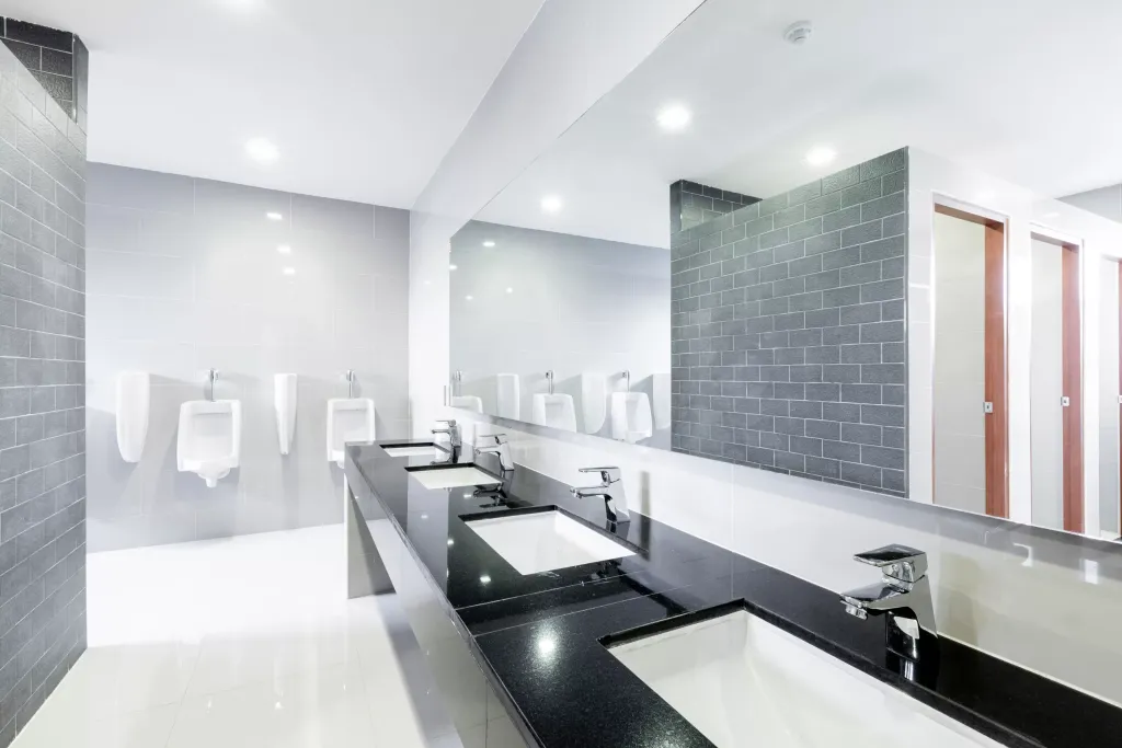 public Interior of bathroom with sink basin faucet lined up Modern design.