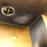 Bubbled and smoked up ceiling after a kitchen fire.